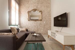 Televízia a/alebo spoločenská miestnosť v ubytovaní Dream Apartments calle Zaragoza