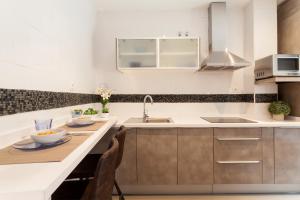 Kuchyňa alebo kuchynka v ubytovaní Dream Apartments calle Zaragoza