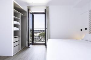 Posteľ alebo postele v izbe v ubytovaní Port Plaza Apartments