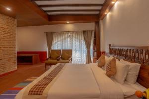 Letto o letti in una camera di Pahan Chhen - Boutique Hotel