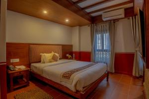 Letto o letti in una camera di Pahan Chhen - Boutique Hotel