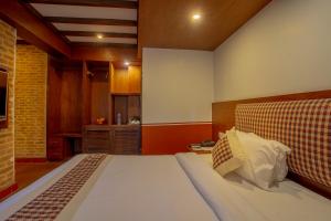 Letto o letti in una camera di Pahan Chhen - Boutique Hotel