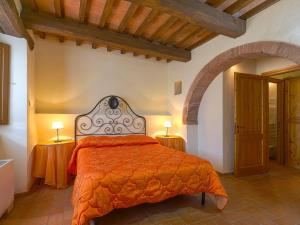 A bed or beds in a room at Apartment Michelangelo by Interhome