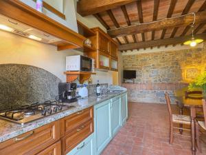A kitchen or kitchenette at Apartment Michelangelo by Interhome