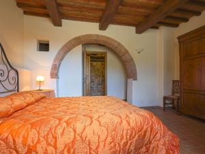 A bed or beds in a room at Apartment Michelangelo by Interhome