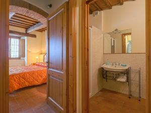 A bed or beds in a room at Apartment Michelangelo by Interhome