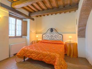 A bed or beds in a room at Apartment Michelangelo by Interhome
