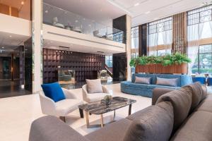 Posezení v ubytování Ramada Plaza by Wyndham Bangkok Sukhumvit 48