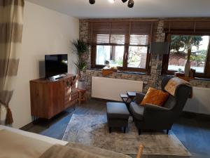 TV a/nebo společenská místnost v ubytování Privatzimmer Spahn in Mühlheim