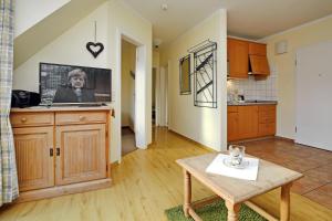 Μια τηλεόραση ή/και κέντρο ψυχαγωγίας στο Ostseewelle Wohnung 24 +10 φωτογραφίες