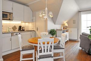 Η κουζίνα ή μικρή κουζίνα στο Ostseewelle Wohnung 26