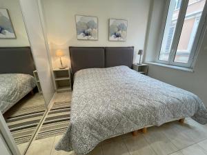 מיטה או מיטות בחדר ב-La Fontaine