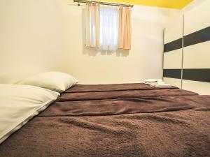 Posteľ alebo postele v izbe v ubytovaní Apartment Anić-1 by Interhome