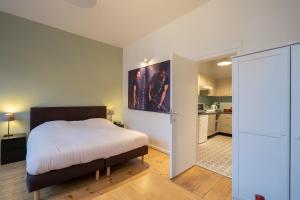 Voodi või voodid majutusasutuse Because the Night city lodge toas