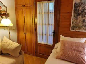 Postel nebo postele na pokoji v ubytování Chardín d'Alto-Apartamentos Chardins