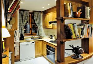 Kuchyň nebo kuchyňský kout v ubytování Chardín d'Alto-Apartamentos Chardins