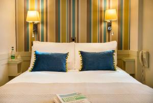 Ένα ή περισσότερα κρεβάτια σε δωμάτιο στο The Marcy Hotel