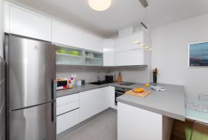 Kuchyňa alebo kuchynka v ubytovaní Split Sky Apartment