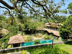 an aerial view of a resort with a swimming pool at Green Escape Unawatuna in Unawatuna