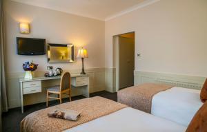 Ένα ή περισσότερα κρεβάτια σε δωμάτιο στο The Marcy Hotel