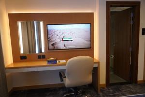 TV a/nebo společenská místnost v ubytování AL HAYAT HOTEL