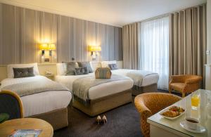 Ένα ή περισσότερα κρεβάτια σε δωμάτιο στο The Marcy Hotel