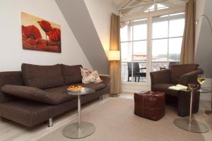 Posezení v ubytování Strandstraße 16 Wohnung 31