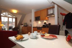 Kuchyň nebo kuchyňský kout v ubytování Strandstraße 16 Wohnung 31