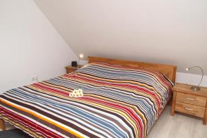 Postel nebo postele na pokoji v ubytování Strandstraße 16 Wohnung 31