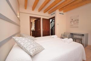 Postel nebo postele na pokoji v ubytování Casa Alcariot 252 by Mallorca Charme