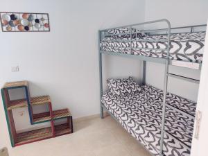 Łóżko lub łóżka w pokoju w obiekcie MARAVILLA Suite 140 m2 - 3 Bedrooms, Heated Pool