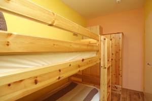 Ein Bett oder Betten in einem Zimmer der Unterkunft Meeresblick Wohnung 408