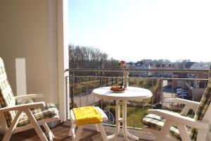 Ein Balkon oder eine Terrasse in der Unterkunft Meeresblick Wohnung 408