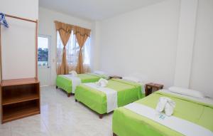 Voodi või voodid majutusasutuse Paraiso de Isabela toas