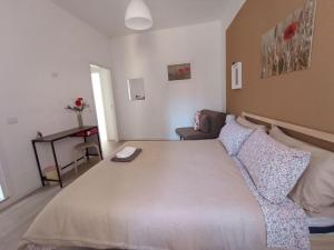 Postel nebo postele na pokoji v ubytování B&B Bel Fiore