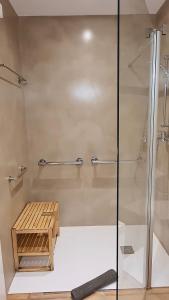 a shower in a bathroom with a glass door at Opening Doors Vilassar. Family house Beach & Relax in Vilassar de Mar +37 photos