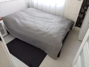 Posteľ alebo postele v izbe v ubytovaní Apartament Anita