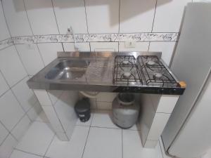 Kuchyň nebo kuchyňský kout v ubytování Sobrado com piscina em Caioba