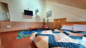 Postel nebo postele na pokoji v ubytování Đông Đức Hostel Đà Lạt