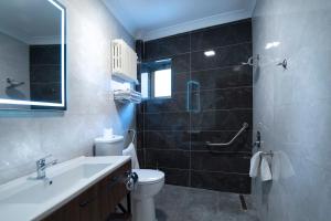 Salle de bains dans l'établissement UK ANKARA Hotel