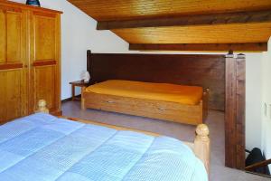 เตียงในห้องที่ Holiday house near beach, St Denis-d'Oléron