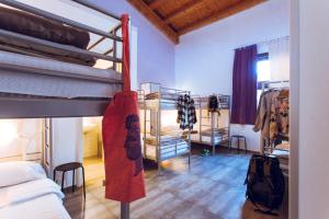 Postel nebo postele na pokoji v ubytování LoL Hostel Siracusa
