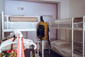 A bed or beds in a room at LoL Hostel Siracusa
