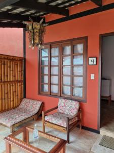 Uma área de estar em Pousada Ikabana