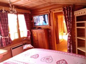 Postel nebo postele na pokoji v ubytování Chalet Le Paradou Adults only