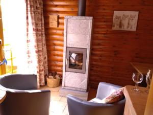 Posezení v ubytování Chalet Le Paradou Adults only