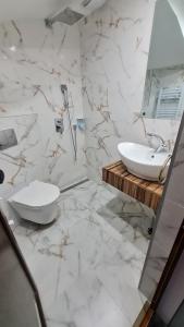 Koupelna v ubytování Hotel Ponti