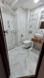 Koupelna v ubytování Hotel Ponti