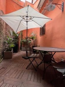 A patio or other outdoor area at Rione Monti Studio Apt with private garden
