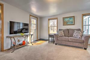 a living room with a couch and a tv at Pet-Friendly Malta Home Near Hunting Areas! in Malta